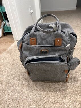 DIKASLON DIAPER BAG BACKPACK WITH SEPERAGE DIAPER PURSE.